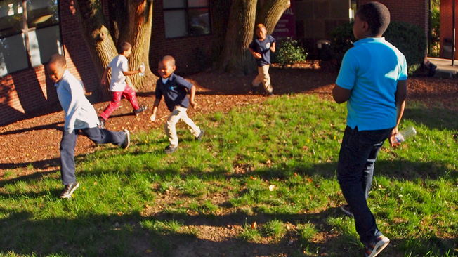 Group of children playing tag